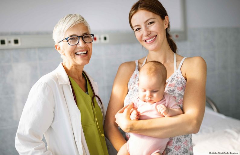 Happy beautiful mother and little baby on medical examination in pediatrician office